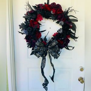 Fall/Halloween wreath. Black/red flowers with pumpkin and bow.